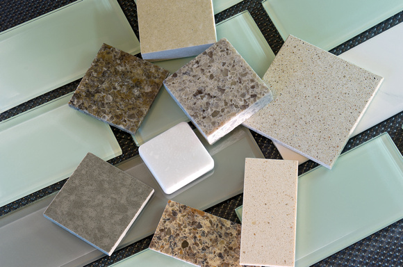 Backsplash tiles and quartz countertop samples
