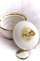 Ceramic Bowl and Lid Against White