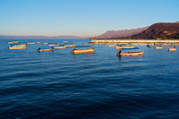 boats and pier on lake chapala at daybreak