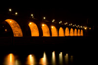 Stone Arch Bridge Under Lights