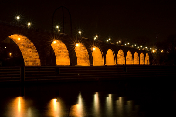 Stone Arch Bridge Under Lights