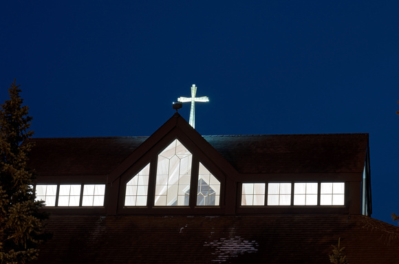 Church Cross and Nave Illuminated