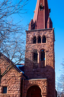 Bell Tower and Steeple Above Church Entrance in Saint Paul