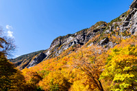 vibrant forest foliage and mountains at smugglers notch